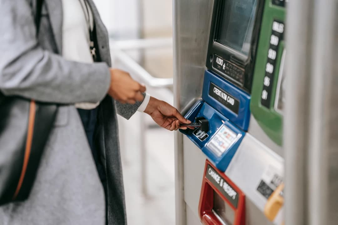 Person using an ATM.